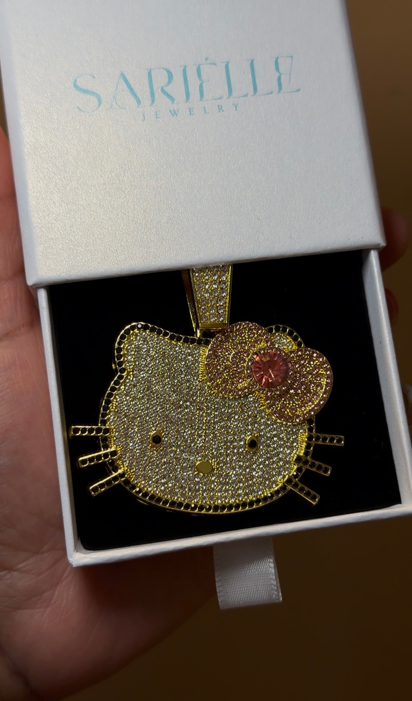 HK PINK BOW PENDANT