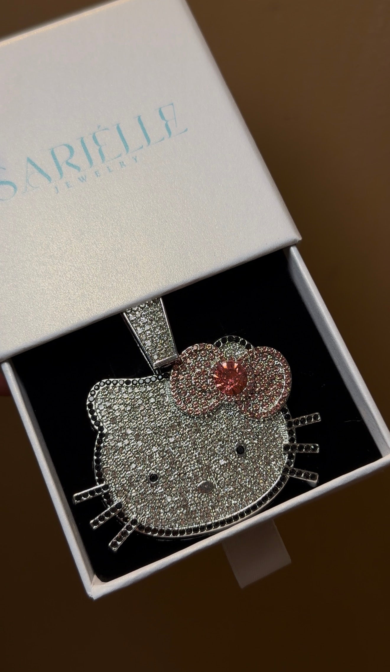 HK PINK BOW PENDANT